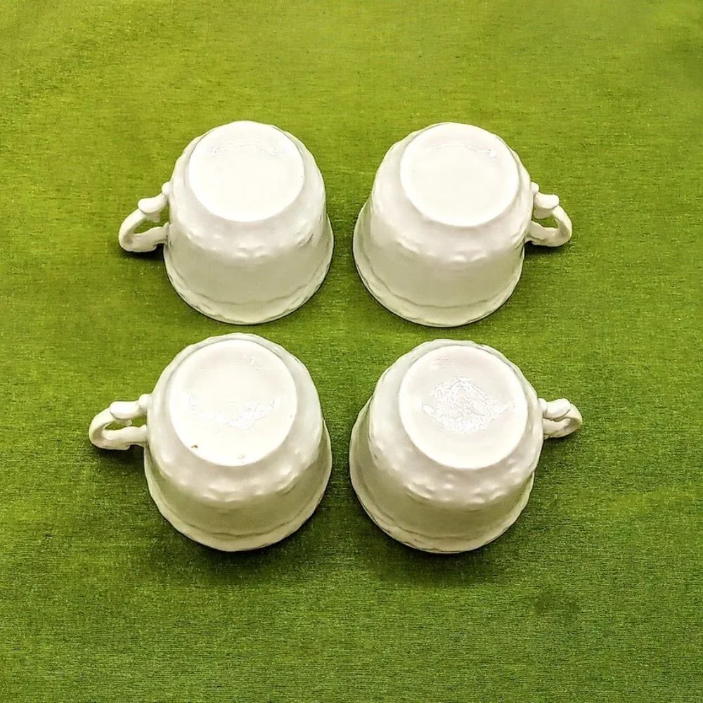 Set of 4 White Porcelain Demitasse Cups & Saucers